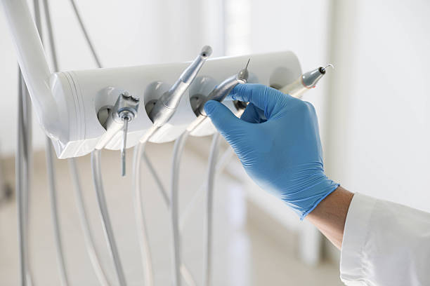 Professional Tooth Extraction technician working in Park City, KS